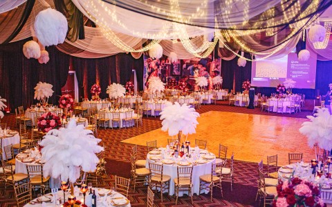 ballroom set up for an event with a dance floor